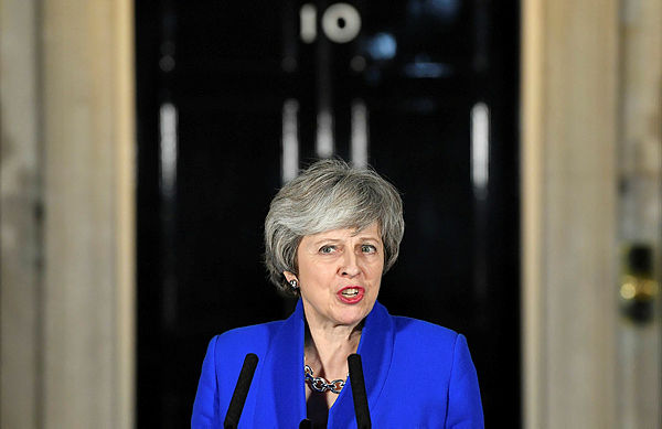 Britain’s Prime Minister Theresa May delivers a speech to members of the media in Downing Street in London — AFP