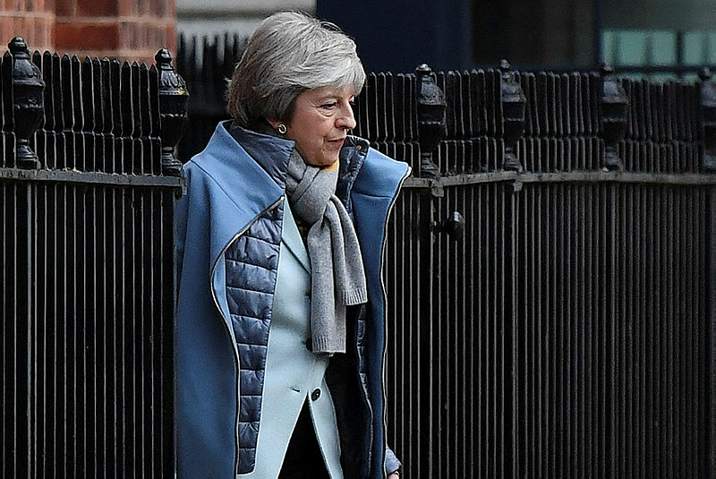 Britain’s Prime Minister Theresa May leaves from the rear of 10 Downing Street in central London on Jan 18, 2019. — AFP