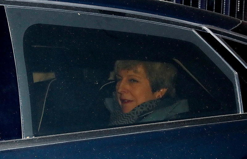 Britain’s Prime Minister Theresa May leaves from the Houses of Parliament in Westminster, in central London on March 27, 2019, after hearing the outcome of the indicative votes on the alternative options for Brexit. — AFP