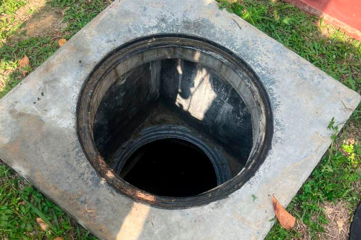 Sewage pithole at the Lenggeng school. - via social media