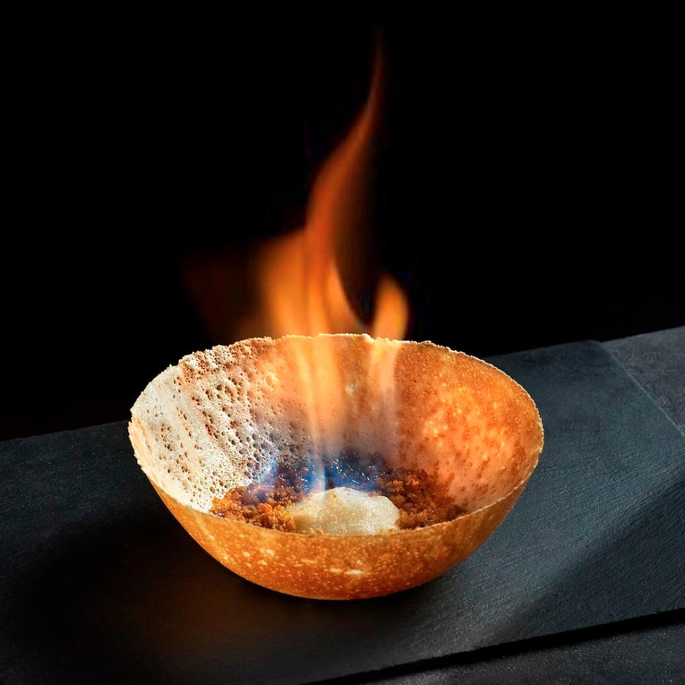 $!The Flaming Appam is doused in sweet brandy.