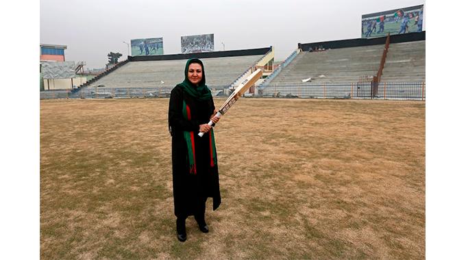 A file photo of the founder of national women’s team, Afghan Diana Barakzai, posing for a pictureat the Kabul cricket stadium in December 2014. – REUTERSPIX