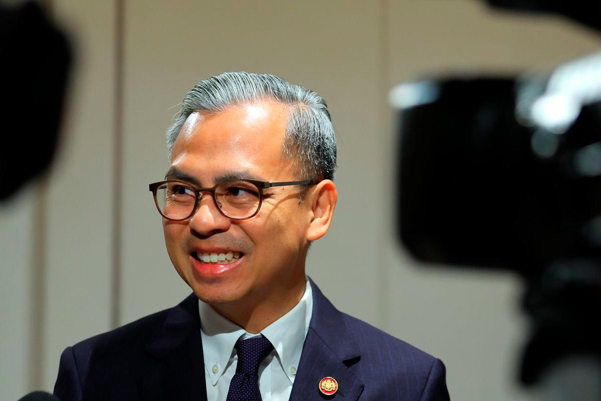 Communications Minister Datuk Fahmi Fadzil speaks to the media after concluding a historic two-day official visit to Timor-Leste with Prime Minister Datuk Seri Anwar Ibrahim and the Malaysian delegation today. - BERNAMA