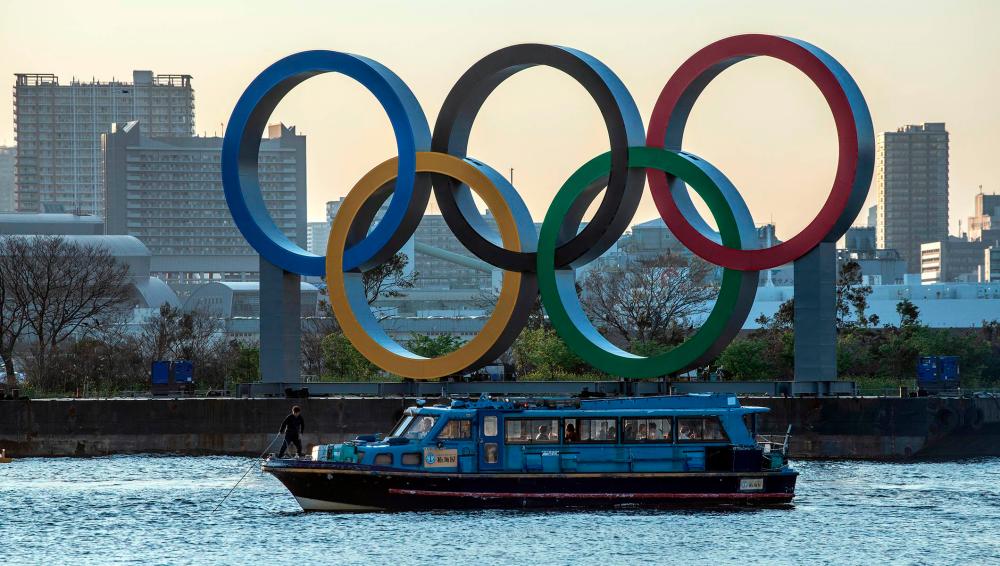 Six Tokyo Olympic torch staffers diagnosed with Covid-19