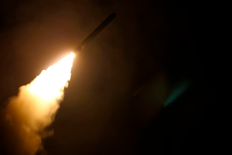 The US Navy guided-missile destroyer USS Laboon fires a Tomahawk land attack missile April 14, 2018. US. REUTERSPIX