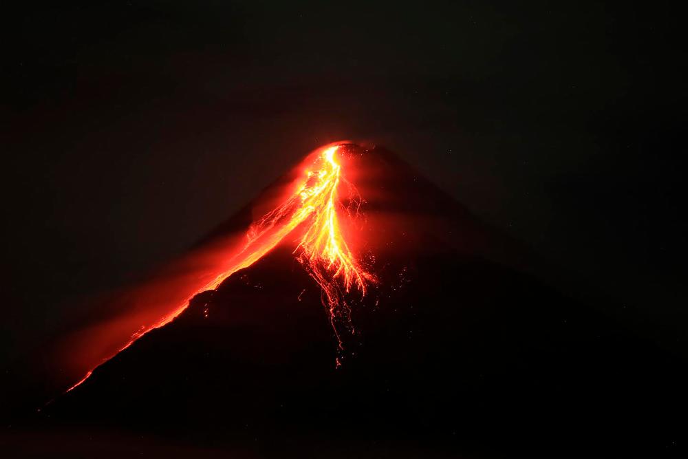 Mount Mayon spews lava during an eruption near Legazpi city in Albay province, south of Manila on June 11, 2023. AFPPIX
