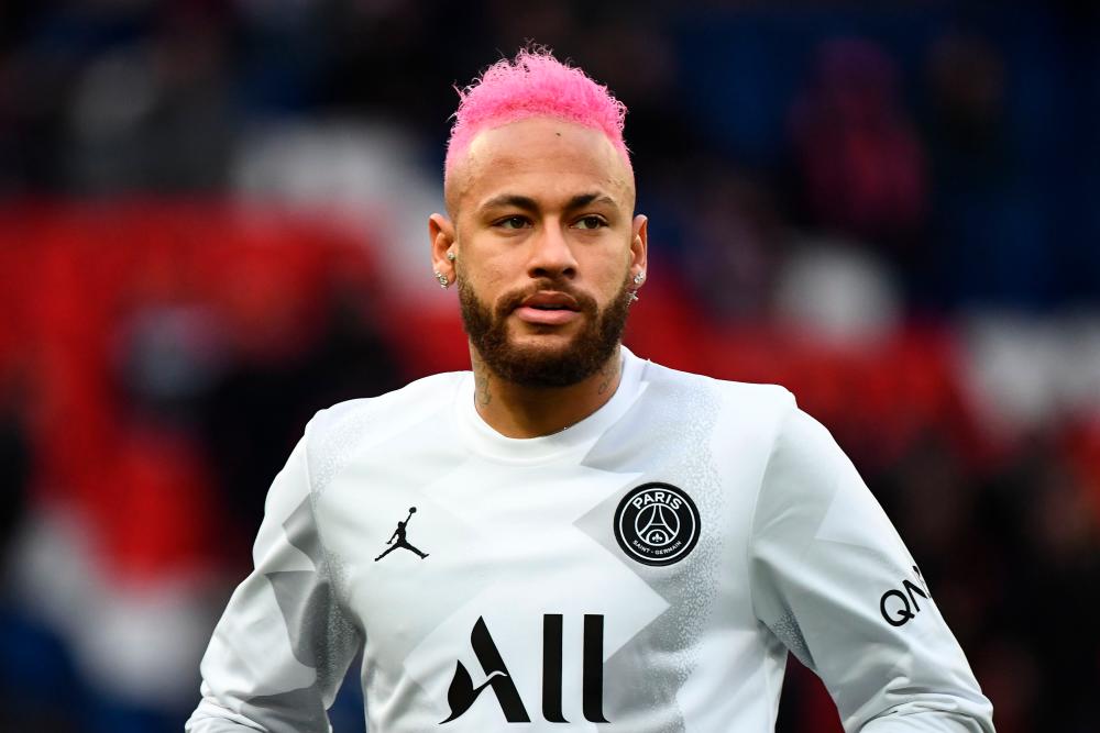 Paris Saint-Germain's Brazilian forward Neymar looks on during warm-up prior to the French L1 football match between Paris Saint-Germain (PSG) and Montpellier Herault SC at the Parc des Princes stadium in Paris, on February 1, 2020. - AFP