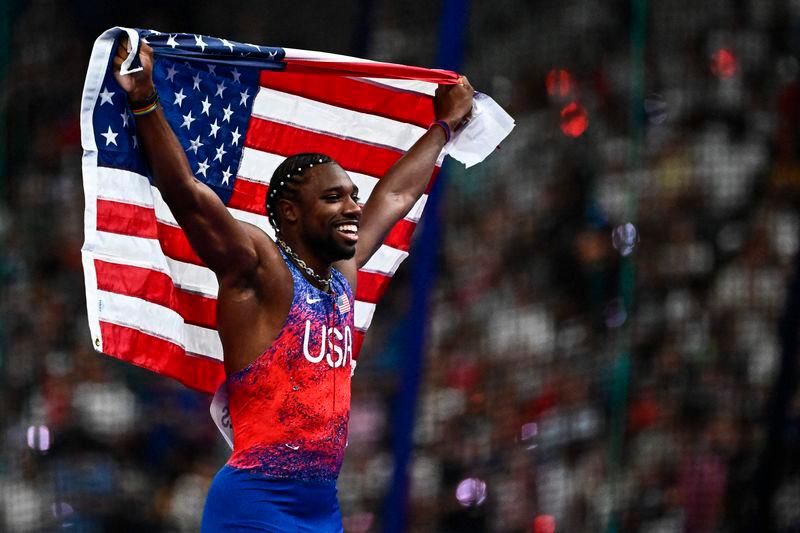US’ Noah Lyles celebrates after winning the men’s 100m final of the athletics event at the Paris 2024 Olympic Games at Stade de France in Saint-Denis - AFPpix