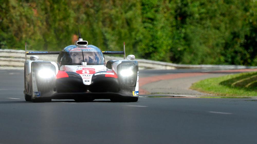 Spain's driver Fernando Alonso steers his Toyota TS050 Hybrid LMP1 during the 87th edition of the 24 Hours Le Mans endurance race, at Le Mans northwestern France, on June 15, 2019. — AFP