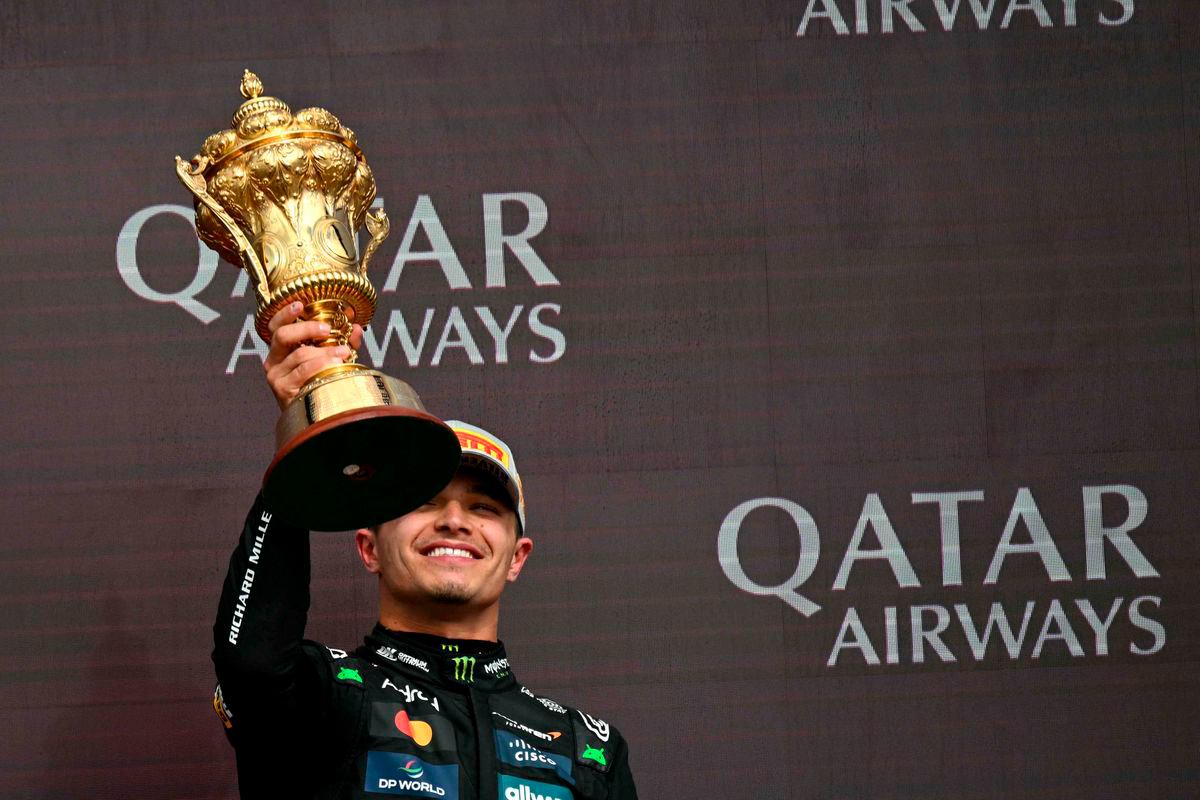 McLaren’s British driver Lando Norris lifts the first place trophy after winning the Formula One British Grand Prix at the Silverstone motor racing circuit in Silverstone, central England, on July 6, 2025-AFP