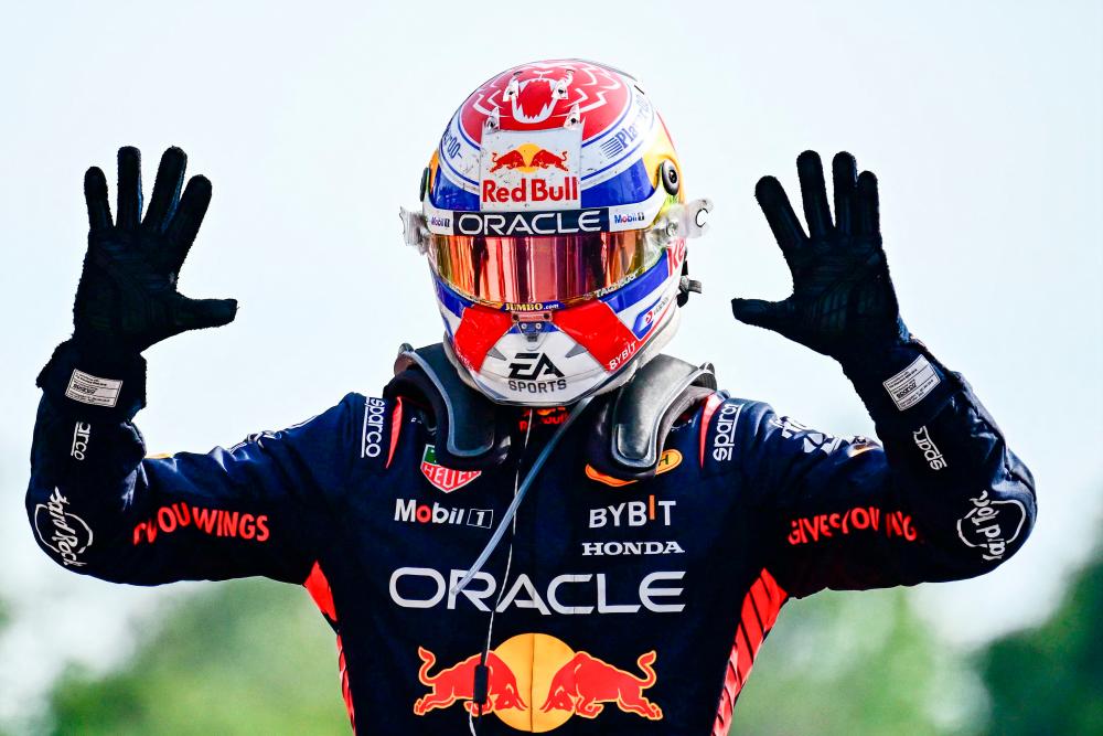 Red Bull Racing's Dutch driver Max Verstappen celebrates after winning the Italian Formula One Grand Prix race at Autodromo Nazionale Monza circuit, in Monza on September 3, 2023. AFPPIX