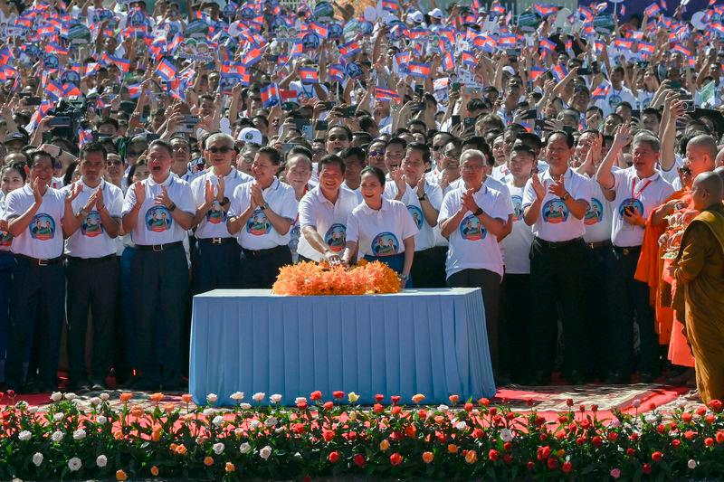 Cambodia’s Prime Minister Hun Manet and his wife (C) press a button to start the groundbreaking ceremony of the Funan Techo Canal in Kandal - AFPpix