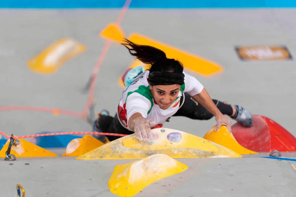 Iranian climber who competed without hijab back in Tehran