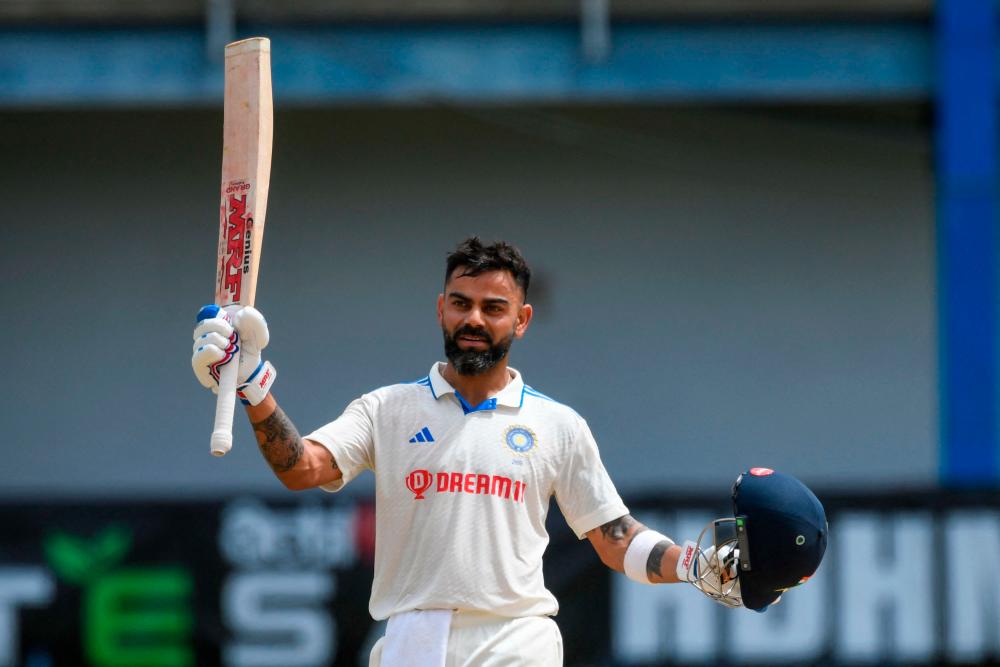 Virat Kohli of India celebrates his century during the second day of the second Test cricket match between India and West Indies at Queen’s Park Oval in Port of Spain, Trinidad and Tobago, July 21, 2023/AFPPix