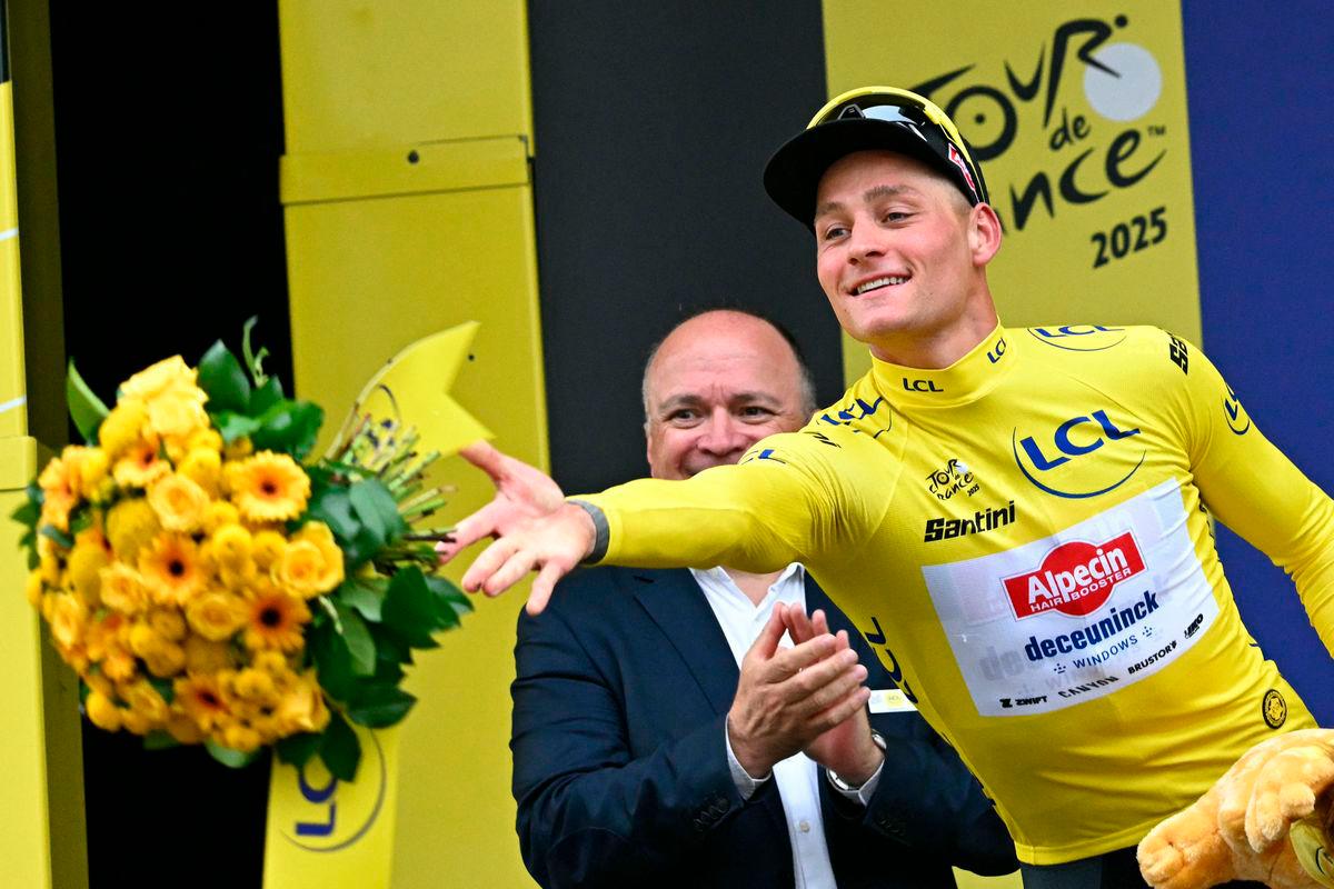 Alpecin - Deceuninck team’s Dutch rider Mathieu van der Poel celebrates on the podium with the overall leader’s yellow jersey after the 2nd stage of the 112th edition of the Tour de France cycling race, 209.1 km between Lauwin-Planque and Boulogne-sur-Mer, Northern France, on July 6, 2025 -AFP