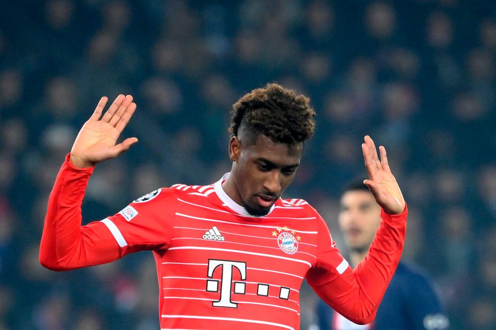 Bayern Munich’s French forward Kingsley Coman celebrates scoring his team’s first goal during first leg of the UEFA Champions League round of 16 football match between Paris Saint-Germain (PSG) and FC Bayern Munich at the Parc des Princes stadium in Paris on February 14, 2023. AFPPIX