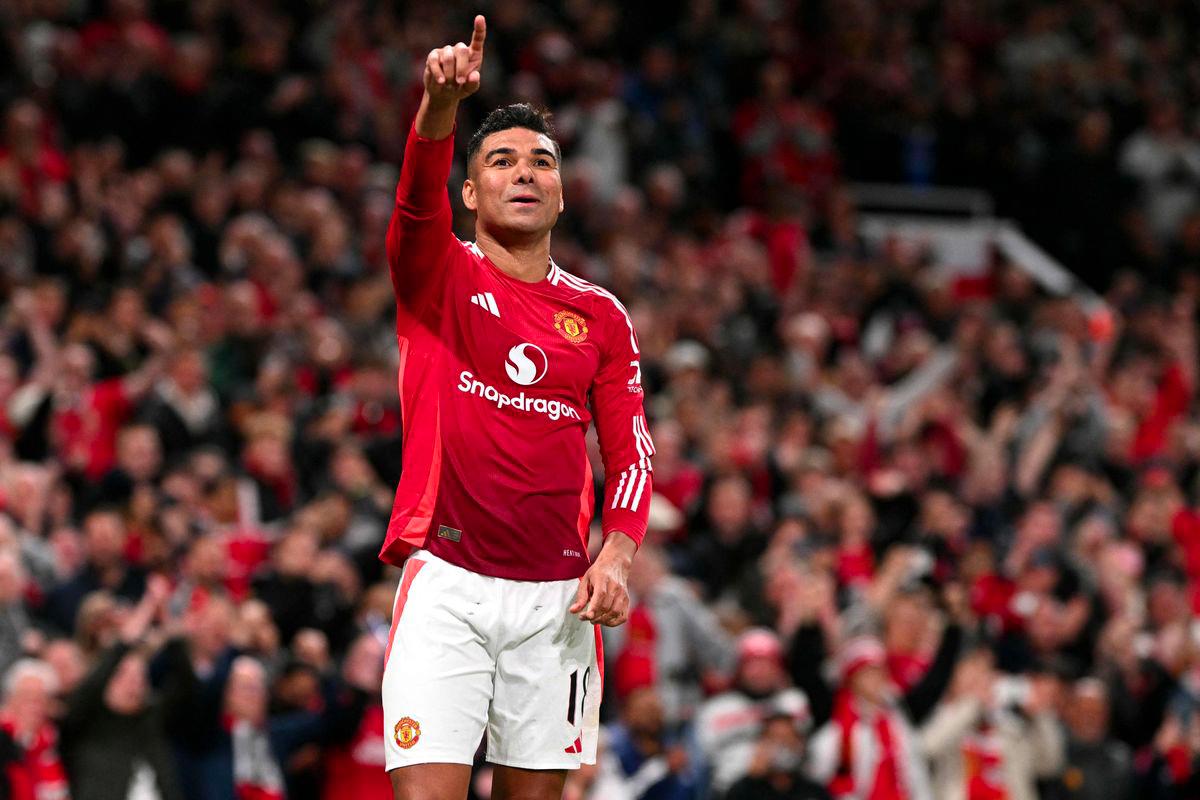Manchester United's Brazilian midfielder #18 Casemiro celebrates after scoring Manchester United's second goal during the UEFA Europa League semi final second leg football match between Manchester United and Athletic Club Bilbao at Old Trafford stadium in Manchester, north west England, on May 8, 2025. - AFPPIX