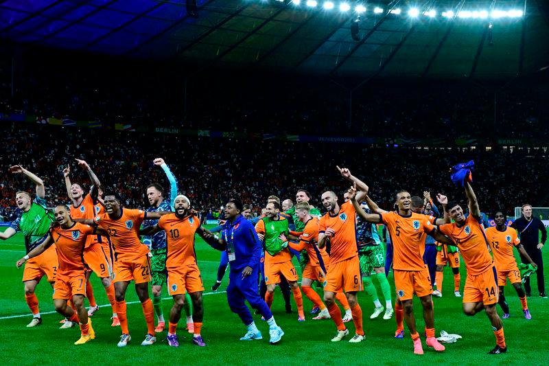 The Dutch players celebrate after the UEFA Euro 2024 quarter-final against Turkey at the Olympiastadion in Berlin - AFPpix