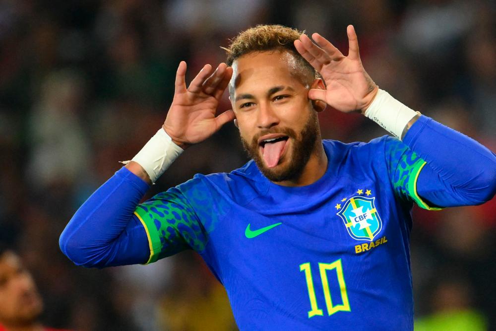 Brazil’s forward Neymar celebrates scoring his team’s third goal during the friendly football match between Brazil and Tunisia at the Parc des Princes in Paris on September 27, 2022. AFPPIX