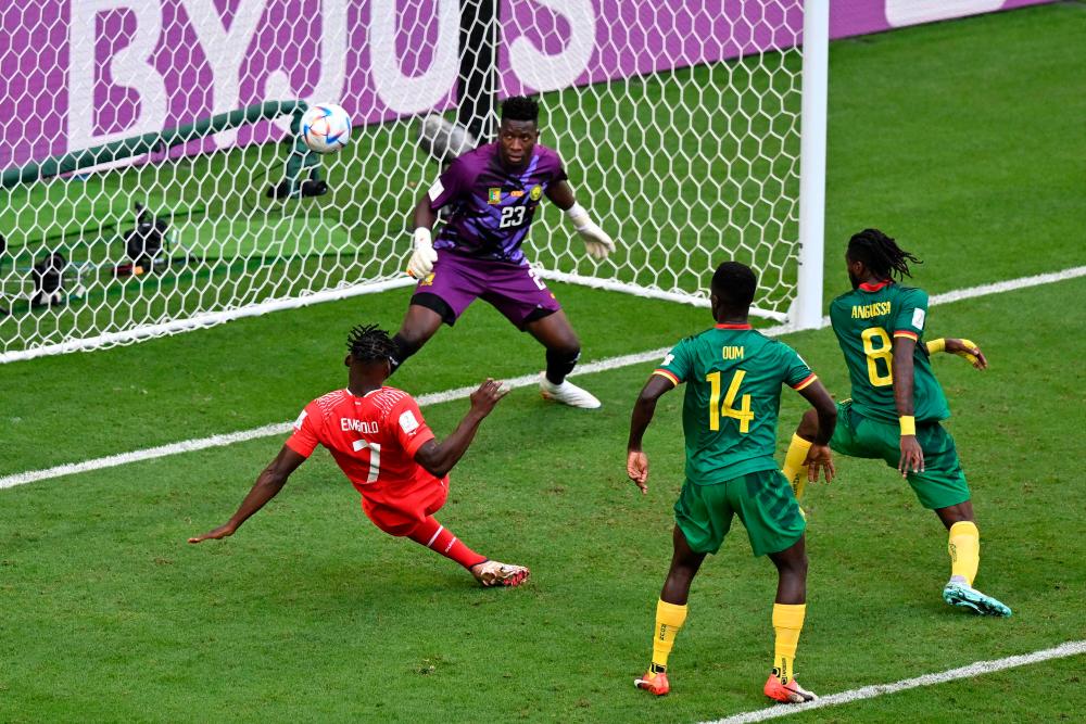 Switzerland’s forward #07 Breel Embolo shoots but fails to score during the Qatar 2022 World Cup Group G football match between Switzerland and Cameroon at the Al-Janoub Stadium in Al-Wakrah, south of Doha on November 24, 2022. AFPPIX