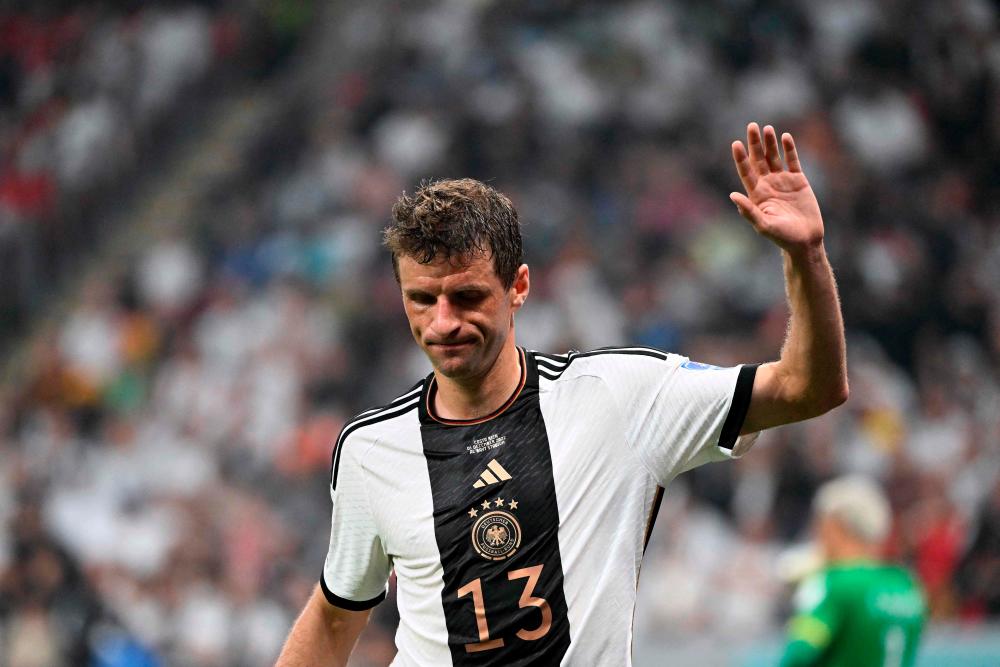 Germany’s forward #13 Thomas Mueller gestures during the Qatar 2022 World Cup Group E football match between Costa Rica and Germany at the Al-Bayt Stadium in Al Khor, north of Doha on December 1, 2022. AFPPIX