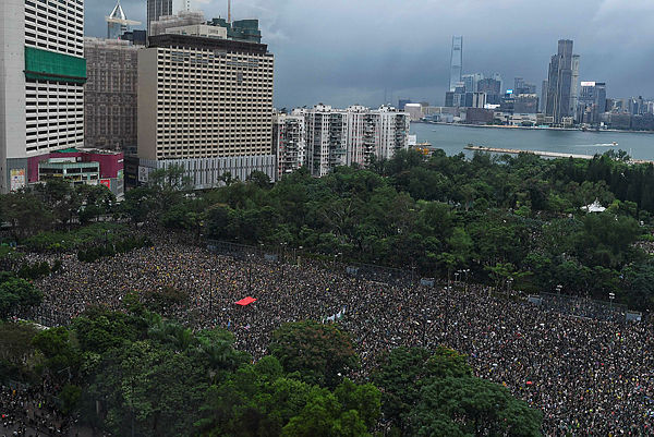 Protesters gather for a rally in Victoria Park in Hong Kong on Aug 18, 2019, in the latest opposition to a planned extradition law that has since morphed into a wider call for democratic rights in the semi-autonomous city. — AFP
