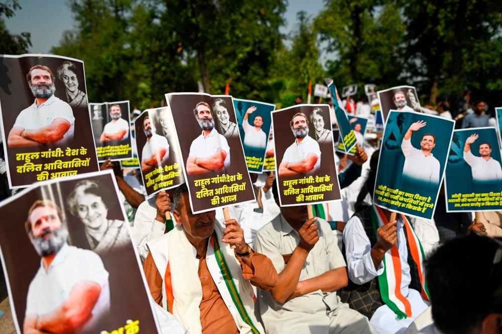 India’s Congress party activists and supporters protest against conviction of Congress party leader Rahul Gandhi in a criminal defamation case, in New Delhi on March 26, 2023. AFPPIX
