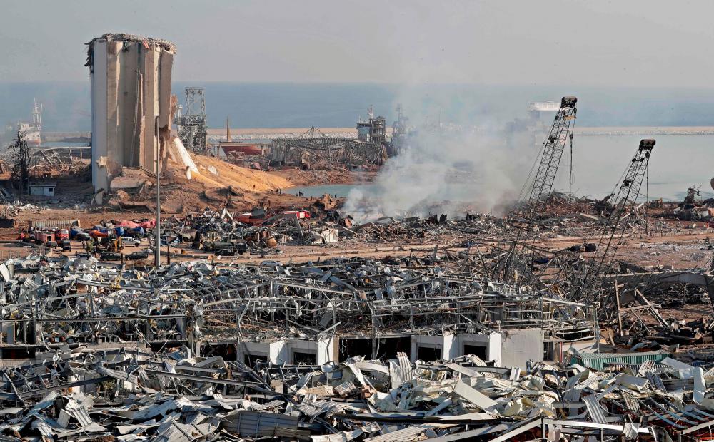 The aftermath of yesterday’s blast is seen at the port of Lebanon’s capital Beirut, on Aug 5, 2020. — AFP