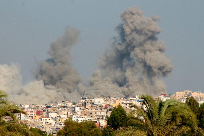 Smoke billows after an Israeli strike on a village near the southern Lebanese city of Tyre on September 29, 2024. - Kawnat HAJU / AFP