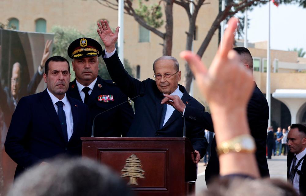 Lebanon’s President Michel Aoun waves to his supporters in front of the presidential palace in Baabda before delivering a speech to mark the end of his mandate, east of the capital Beirut, on October 30, 2022. AFPPIX
