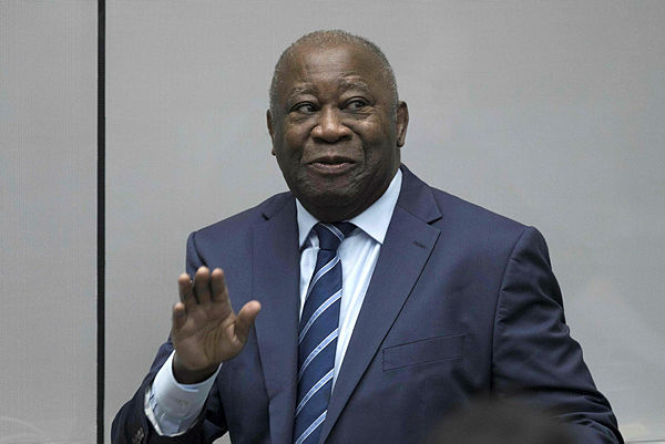 Former Ivory Coast President Laurent Gbagbo enters the courtroom of the International Criminal Court in The Hague on Jan 15, 2019. — AFP