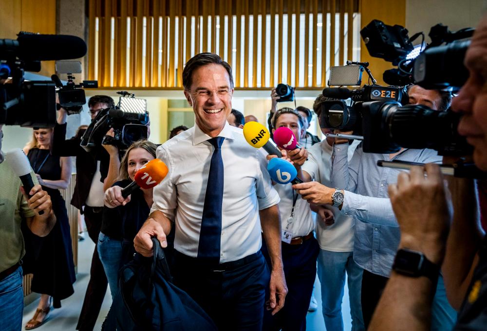Outgoing Prime Minister Mark Rutte arrives for a debate on the fall of the cabinet at the House of Representatives in The Hague, on July 10, 2023/AFPPix