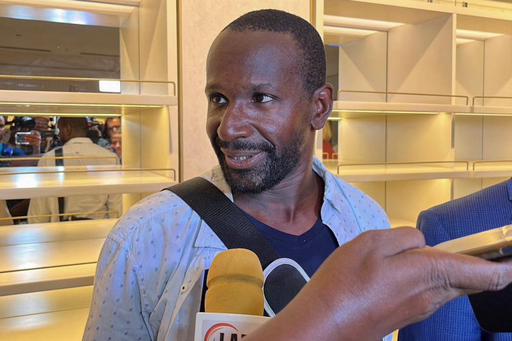 French journalist Olivier Dubois speaks to journalists as he arrives at the Diori Hamani International Airport in Niamey on March 20, 2023 nearly two years after he was kidnapped by the Support Group for Islam and Muslims (GSIM) in Mali. AFPPIX