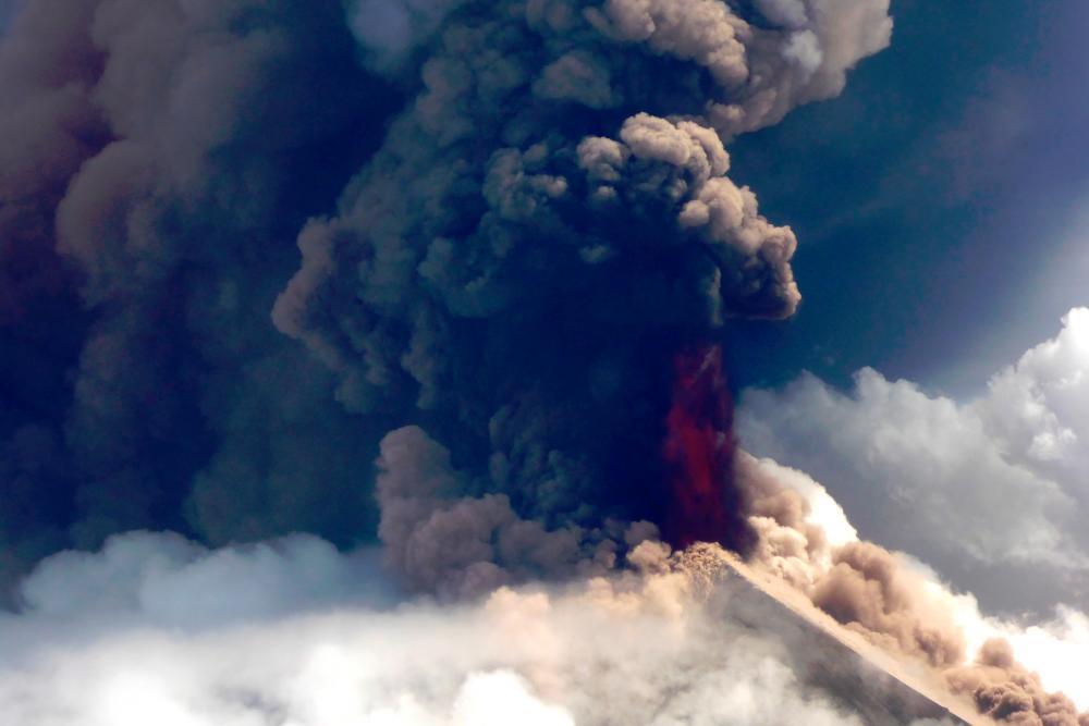 Papua New Guinea’s Mount Ulawun volcano spewing lava. — AFP