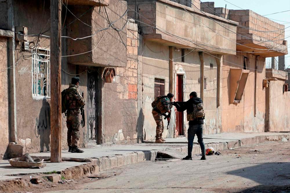 Pasukan keselamatan Kurdish ditempatkan di bandar Hasakeh di utara Syria pada 22 Januari 2022. AFPPIX