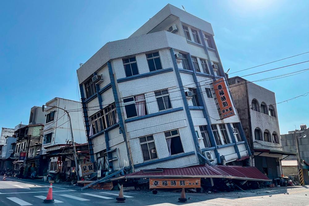 This photo taken by Taiwan's Central News Agency (CNA) on April 3, 2024 shows a damaged building in Hualien, after a major earthquake hit Taiwan's east. - AFPPIX
