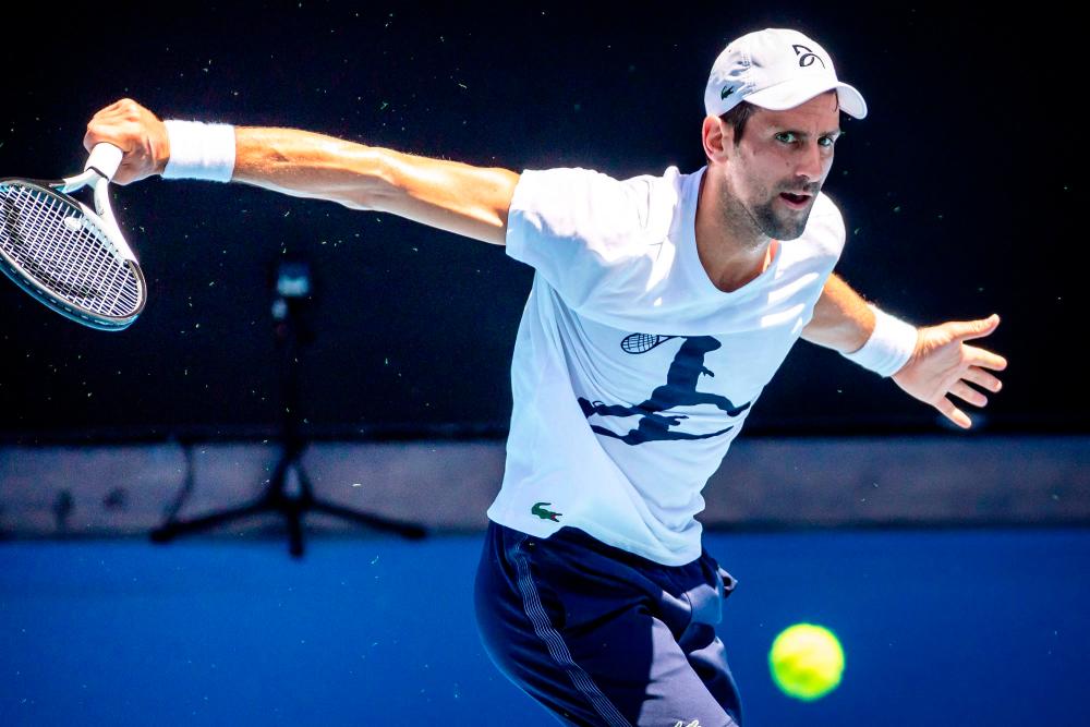 World Number 5 ranked player Novak Djokovic attends a practice match with Russian player Daniil Medvedev ahead of the Australian Open tennis tournament in Melbourne Park on January 11, 2023. AFPPIX