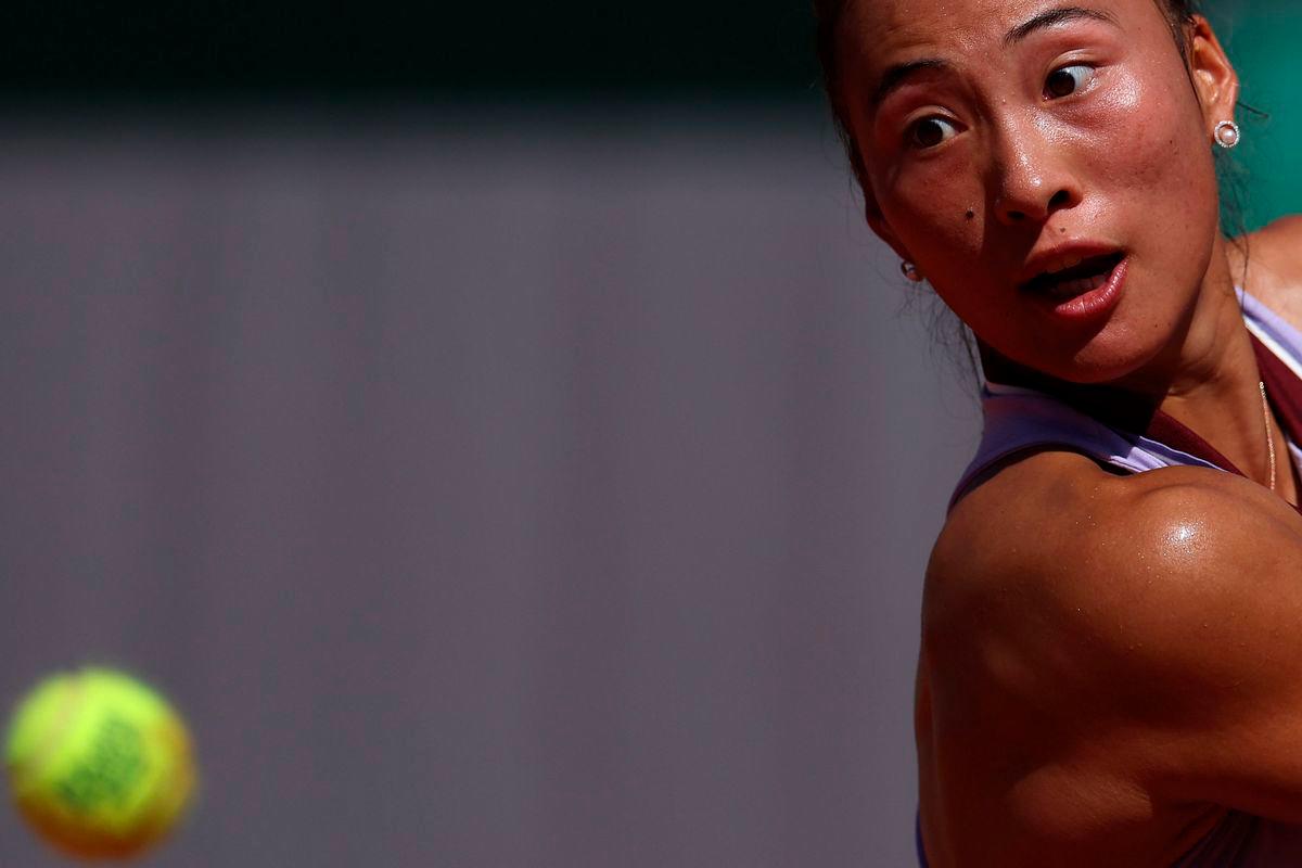 China’s Zheng Qinwen eyes the ball as she plays against Canada’s Victoria Mboko during their women’s singles match on day 6 of the French Open tennis tournament on Court Simonne-Mathieu at the Roland-Garros Complex in Paris on May 30, 2025.