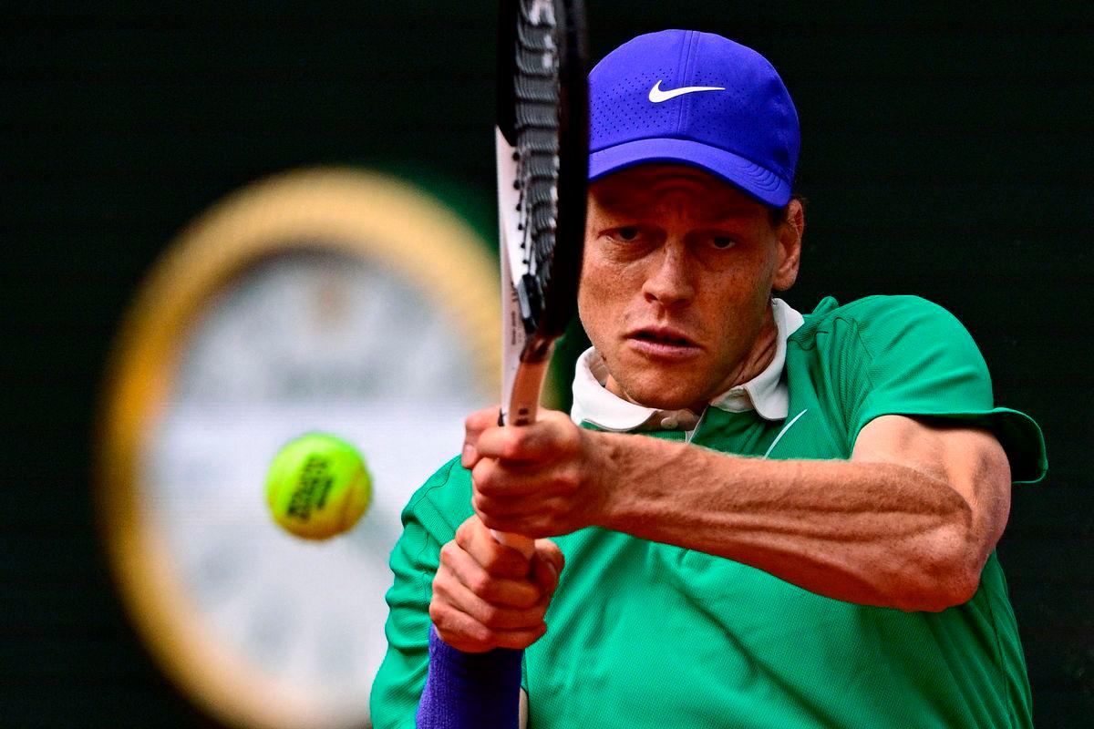 Italy’s Jannik Sinner plays a backhand return to Kazakhstan’s Alexander Bublik during their quarter-final men’s singles match on day 11 of the French Open tennis tournament on Court Philippe-Chatrier at the Roland-Garros Complex in Paris on June 4, 2025. AFP
