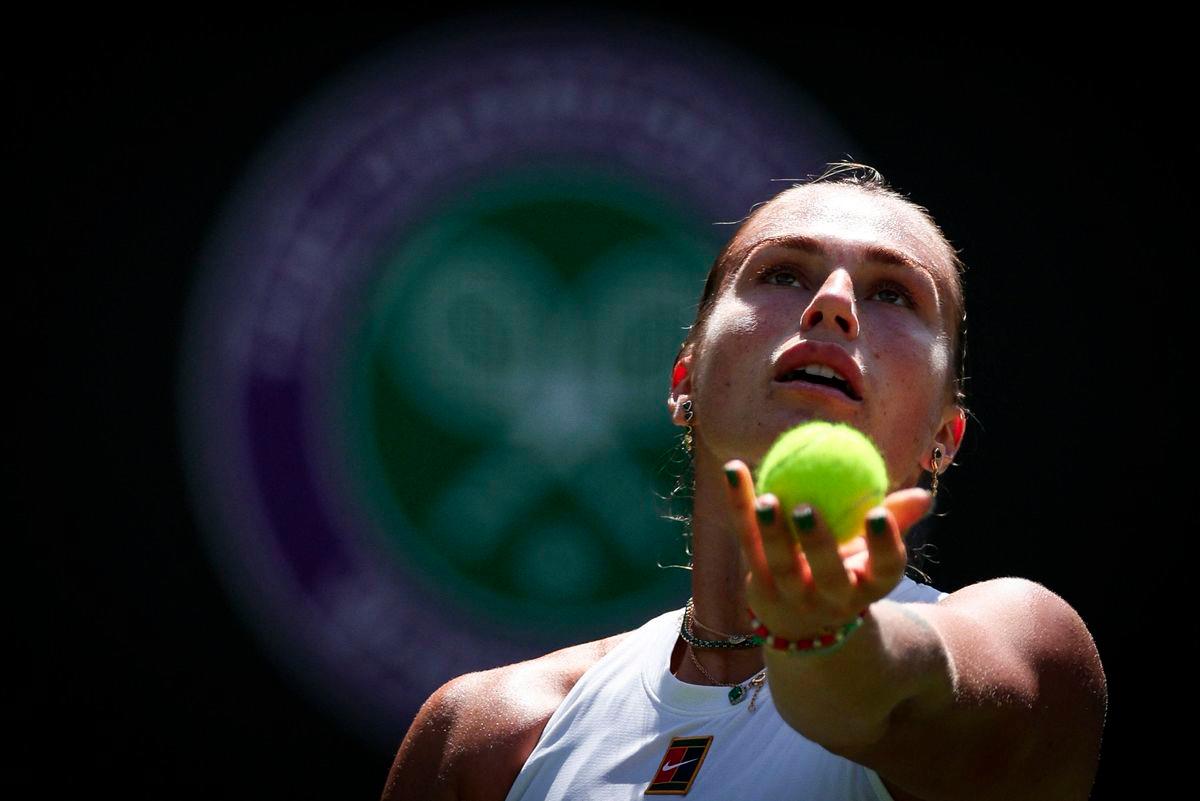 Belarus's Aryna Sabalenka serves to US-Canada's Carson Branstine during their women's singles first round tennis match on the first day of the 2025 Wimbledon Championships at The All England Lawn Tennis and Croquet Club in Wimbledon, southwest London, on June 30, 2025. - AFPPIX