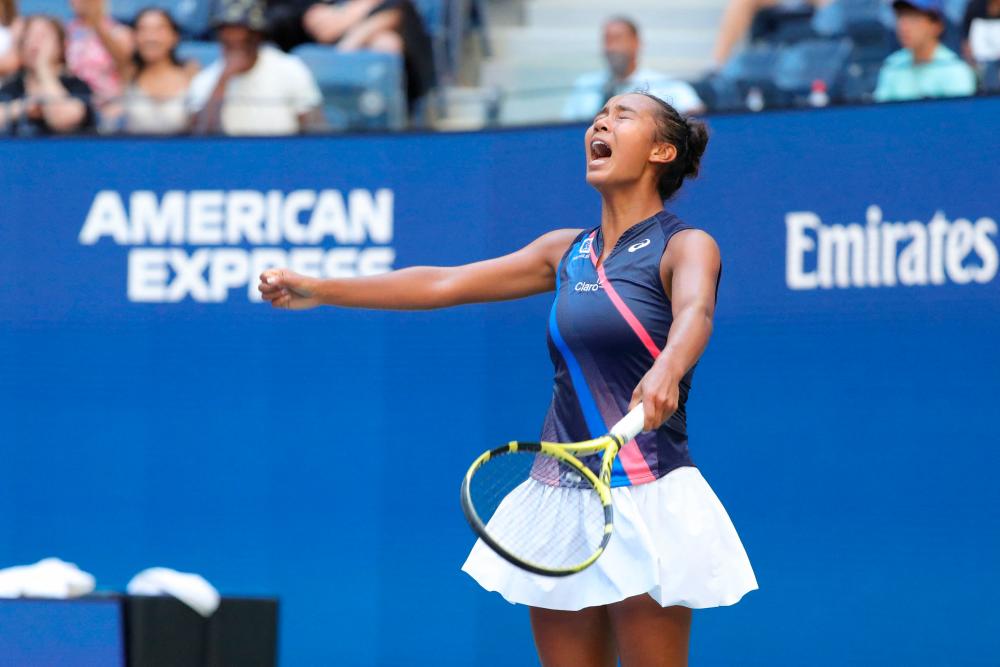 Leylah Fernandez reacts after winning her 2021 US Open Tennis tournament women’s quarter finals match against Ukraine’s Elina Svitolina (not pictured) at the USTA Billie Jean King National Tennis Center in New York. – AFPPIX