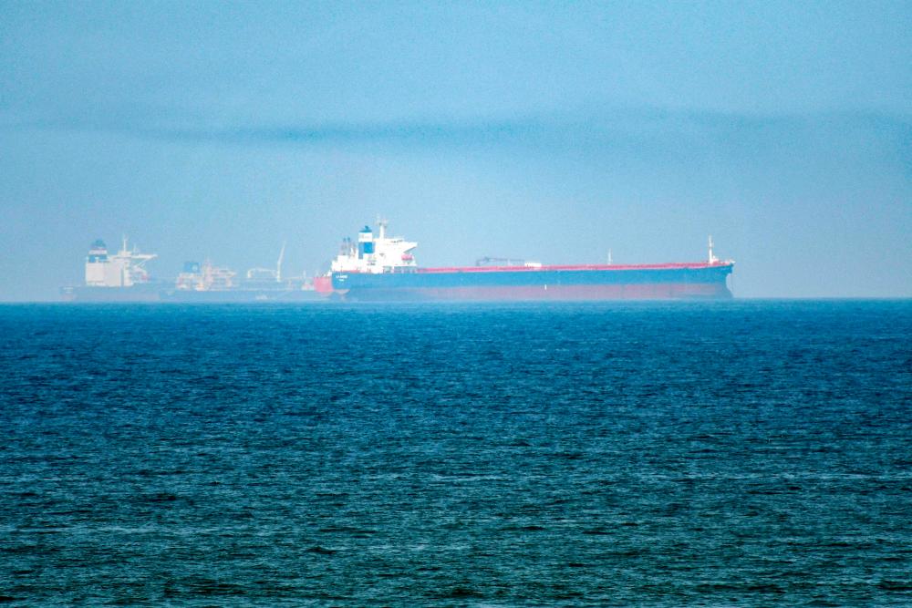 This picture taken on June 15, 2019 shows tanker ships in the waters of the Gulf of Oman off the coast of the eastern UAE emirate of Fujairah. — AFP