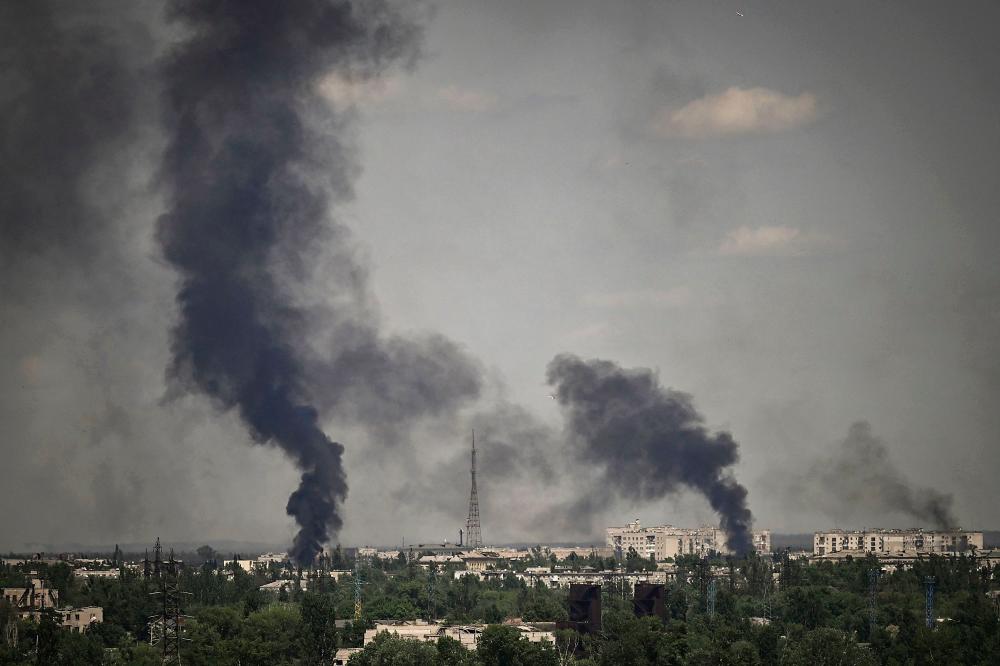 Smoke rises in the city of Severodonetsk during heavy fightings between Ukrainian and Russian troops at eastern Ukrainian region of Donbas on May 30, 2022, on the 96th day of the Russian invasion of Ukraine. AFPPIX