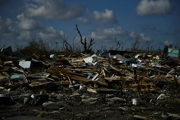 Debris is seen scattered in the “Mudd” neighbourhood in Marsh Harbour, Great Abaco, on September 7, 2019, in the aftermath of Hurricane Dorian. — AFP