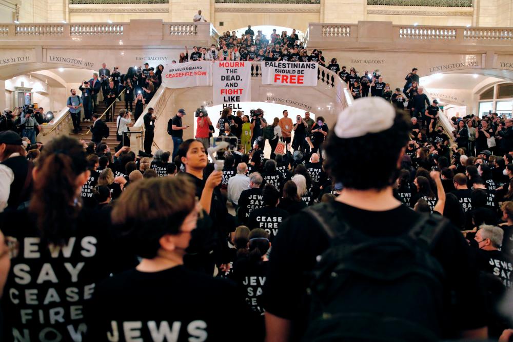 People demonstrate calling for a cease-fire amid war between Israel and Hamas, at Grand Central Station in New York City on October 27, 2023. AFPPIX