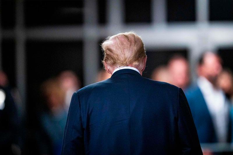 Former US President and Republican presidential candidate Donald Trump departs after speaking to the press after the 12 jurors in his criminal trial began deliberating at Manhattan Criminal Court in New York City on May 29, 2024. - AFPPIX