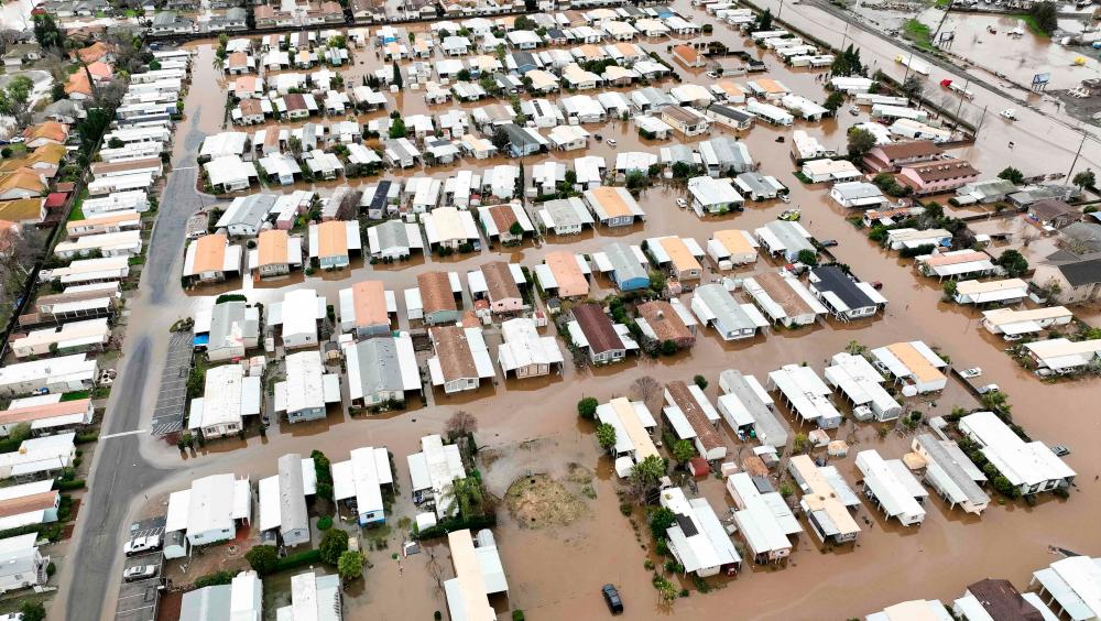 This aerial view shows a flooded neighborhood in Merced, California on January 10, 2023. AFPPIX
