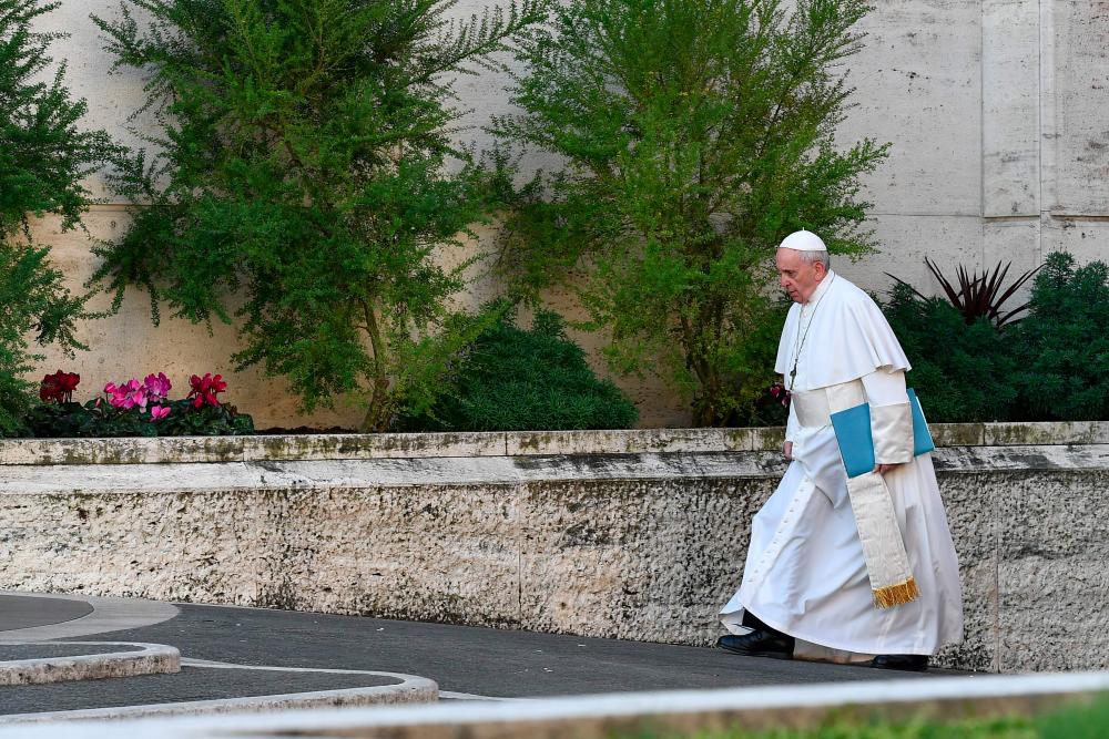 Pope Francis arrives for the opening of a global child protection summit for reflections on the sex abuse crisis within the Catholic Church, on Feb 21, 2019 at the Vatican. — AFP