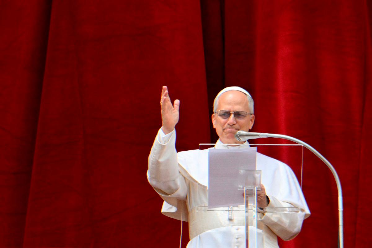 Pope Leo XIV delivers the Regina Caeli prayer from the main central loggia of St Peter’s basilica in The Vatican, on May 11, 2025. - Alberto PIZZOLI / AFP