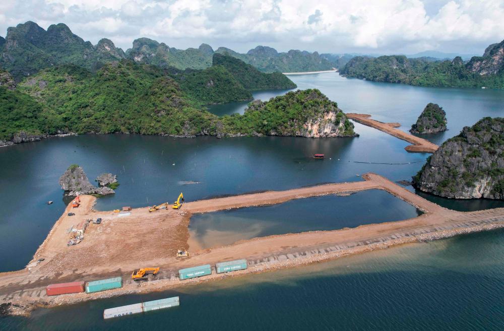 This aerial photo taken on November 4, 2023 shows the construction site of a residential and hotel complex near Ha Long Bay in Vietnam’s Quang Ninh province/AFPPix